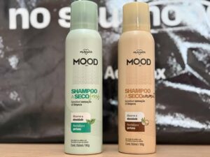 Shampoo a Seco MOOD Fresh e Coconut lado a lado sobre bancada, embalagens em verde e bege, foco em revitalização e perfume.