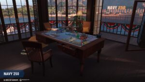Mesa com maquete do Cais da Liberdade em World of Warships, vista para o porto Navy 250 ao fundo.