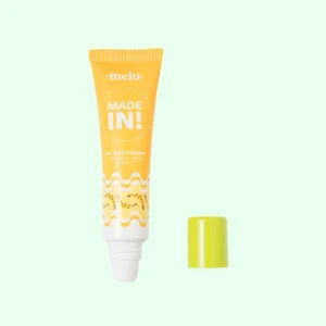 Hidratante labial melu Made In doce de banana em embalagem amarela com ilustração temática.