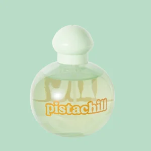 Colônia melu pistachill em frasco redondo verde translúcido com design minimalista e aroma inspirado em sobremesa.