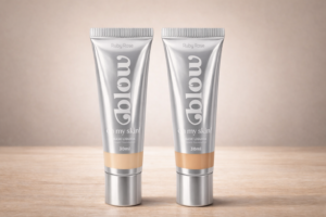 Bases líquidas Blow Oh My Skin da ruby rose em embalagem prateada com dois tons sobre superfície de madeira