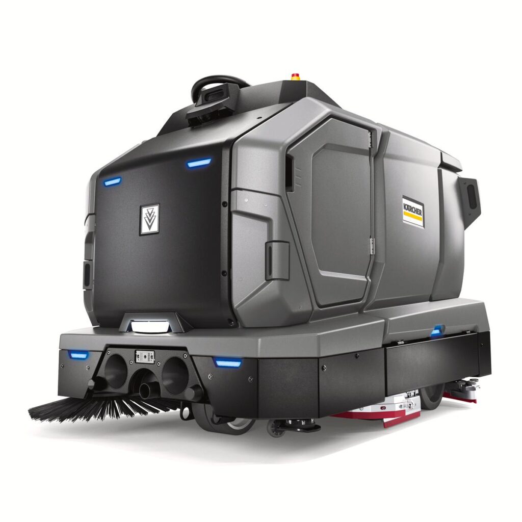 Robô autônomo de limpeza industrial Kärcher Kira B200 exibido em fundo claro, com design robusto, sensores inteligentes e escovas inferiores para limpeza profissional em grandes áreas do varejo.