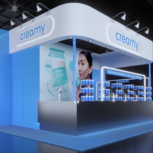 Estande da Creamy na Beauty Show 2026 com iluminação azul, exposição de dermocosméticos e destaque para o lançamento do hidratante Creamy Hydragel Oil Control.