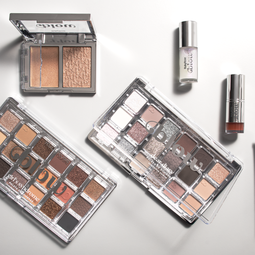 Imagem da linha Blow da Ruby Rose com paletas de sombras em tons neutros e glow, lip oil, iluminador líquido e base glow, dispostos sobre fundo claro.